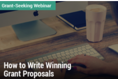 Grant-Seeking Webinar: How to Write Winning Grant Proposals - Image of hands on a computer keyboard
