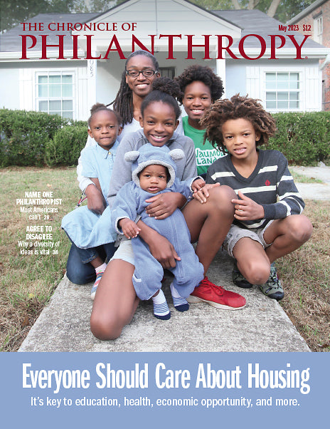 Chronicle Issue May 2023 - Everyone Should Care About Housing - An African American family sitting together in front of a house.