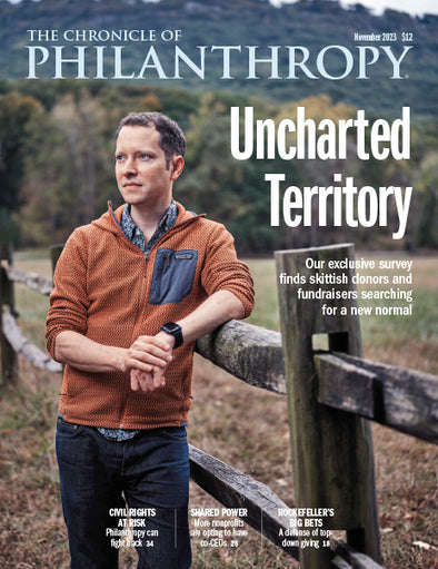 Uncharted Territory November 2023 Issue - Man leaning against a fence gazing off in the distance while outdoors.