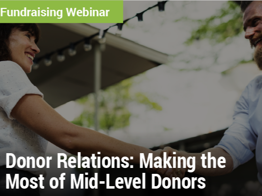 Fundraising Webinar: Donor Relations: Making the Most of Mid-Level Donors - image of two friendly people shaking hands outside