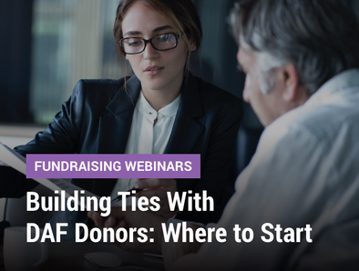 Fundraising Webinars: Building Ties With DAF Donors: Where to Start - Cover image of a professional woman sharing a document with an older gentleman