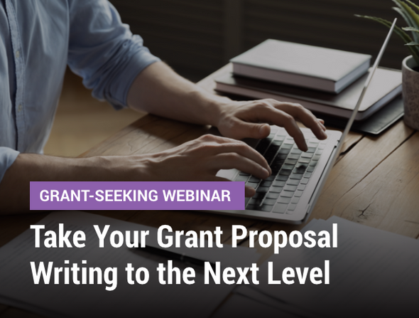 Grant-Seeking Webinar: Take Your Grant Proposal Writing to the Next Level - image of hands on a laptop keyboard